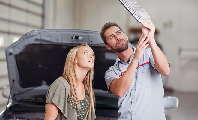 mechanic-showing-customer-dirty-air-filter
