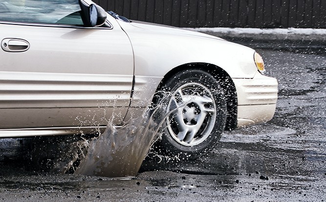 Car-Hitting-Pothole