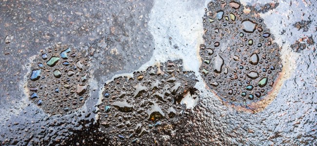 Large-Oil-Leak-On-Road