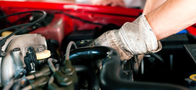 Mechanic-Working-On-Car-Engine