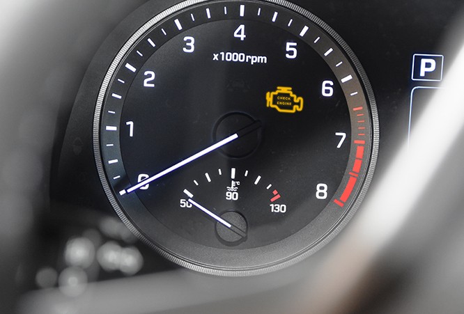 Check-Engine-Light-Illuminated-On-Dashboard-Display